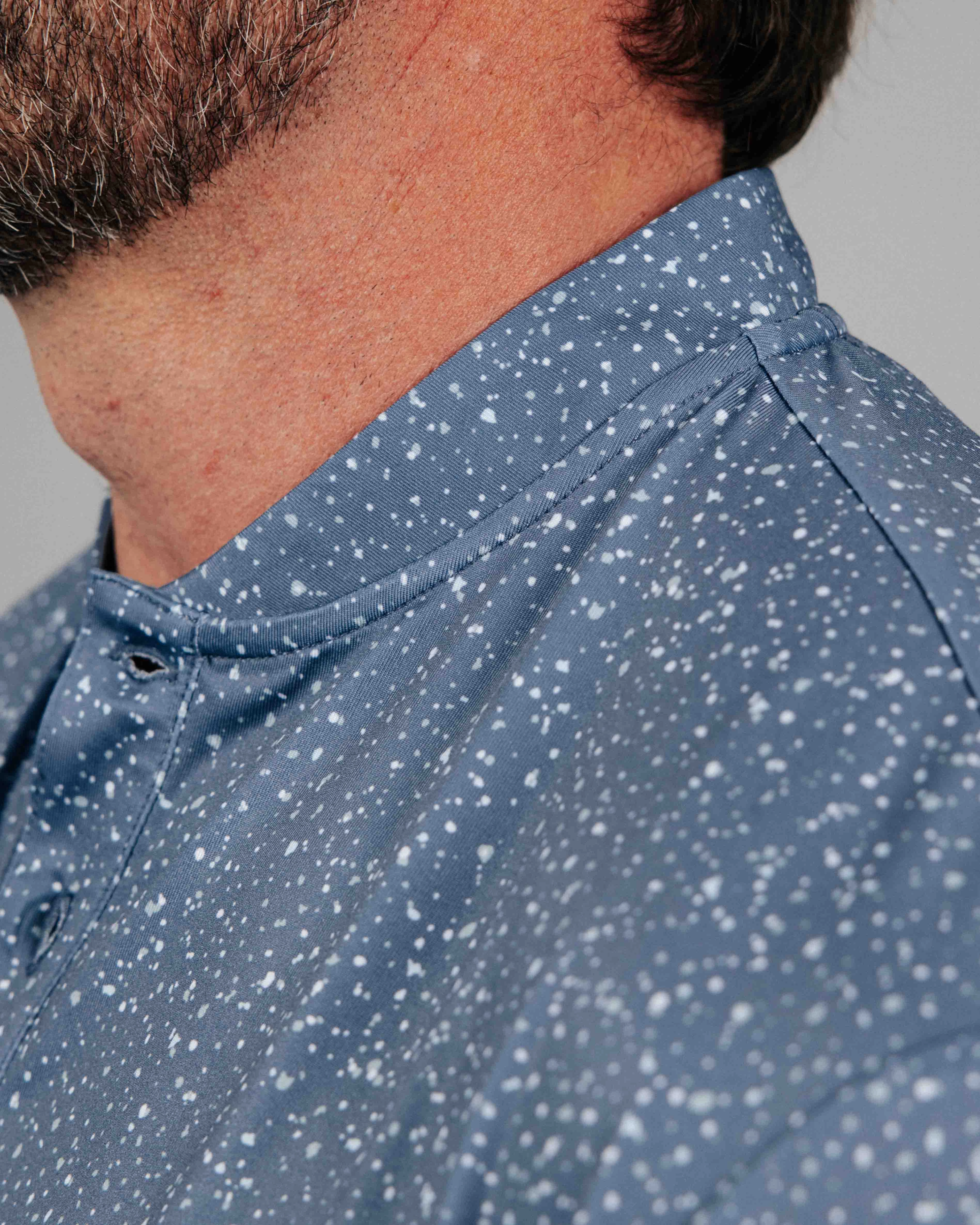 Dusty Blue Speckle Blade Polo Hidden Pocket Design Low Profile Waistband Integration