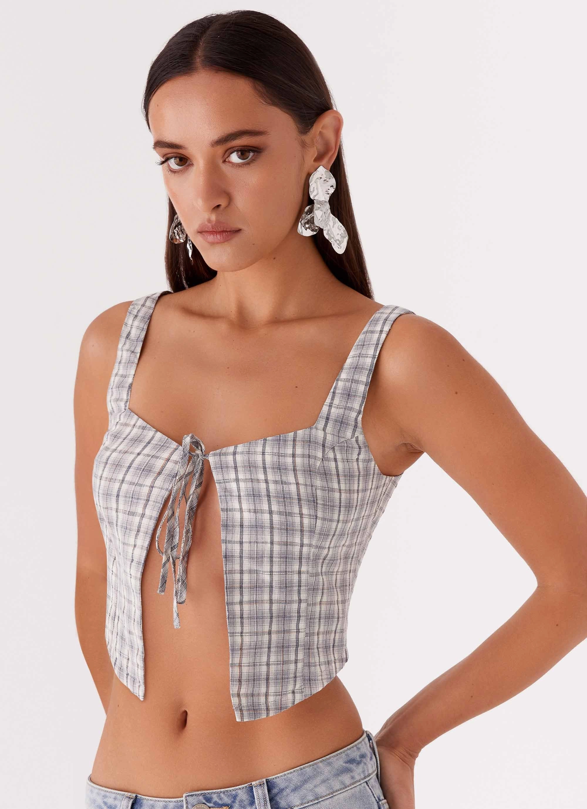 Oasis Dreams Tie Top - Check Quick Access Pockets Minimalist Detailing