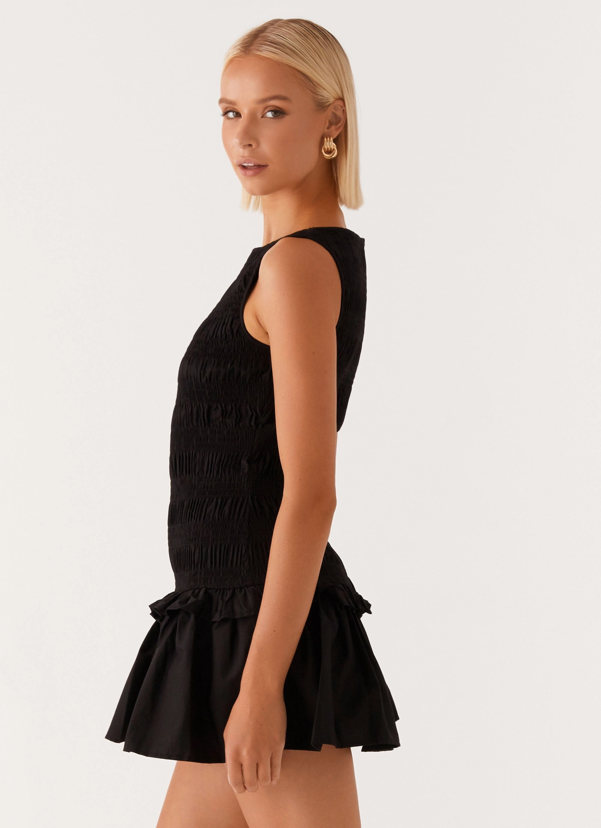 Garden Kisses Shirred Mini Dress - Black Eye Catching Travel Light